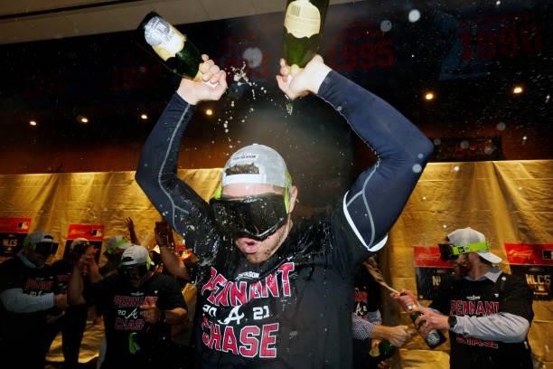 Freddie Freeman of the Atlanta Braves celebrates after the Braves defeated the Milwaukee Brewers in Game 4 of the NLDS at Truist Park on Tuesday,...