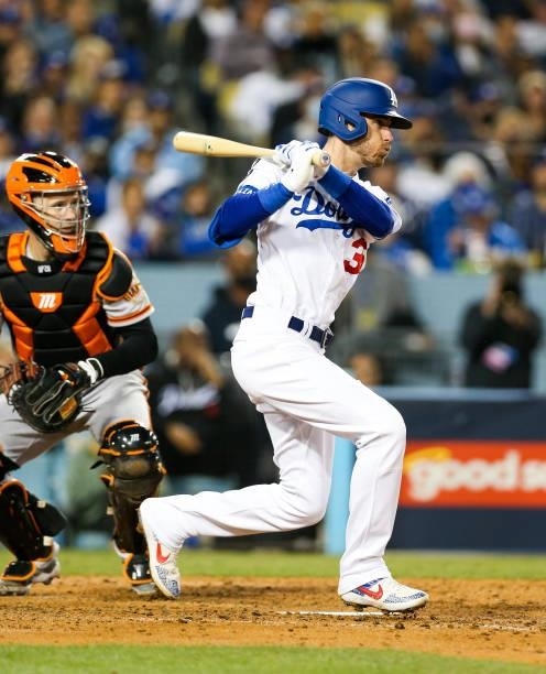 Cody Bellinger of the Los Angeles Dodgers singles in the fifth inning during Game 4 of the NLDS between the San Francisco Giants and the Los Angeles...