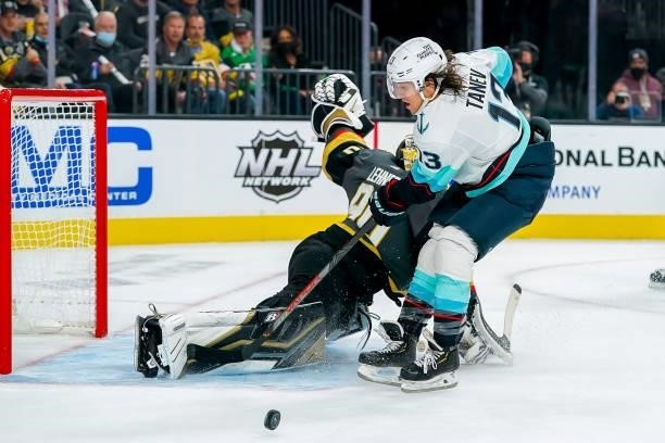 Brandon Tanev of the Seattle Kraken loses control of the puck on a breakaway against goaltender Robin Lehner of the Vegas Golden Knights during first...