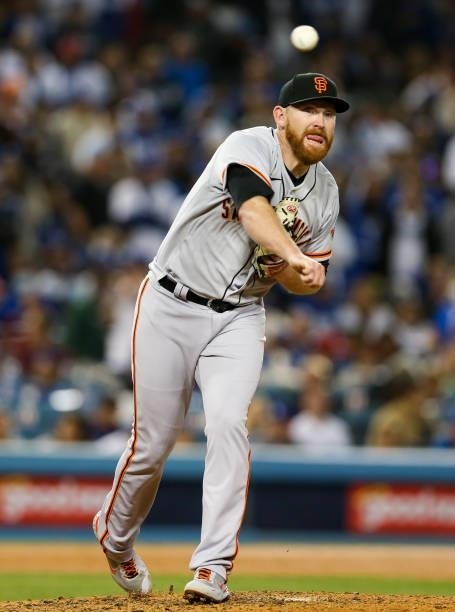 Zack Littell of the San Francisco Giants throws to first during Game 4 of the NLDS between the San Francisco Giants and the Los Angeles Dodgers at...