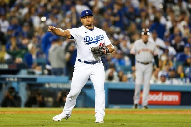 Brusdar Graterol of the Los Angeles Dodgers throws to first in the sixth inning during Game 4 of the NLDS between the San Francisco Giants and the...