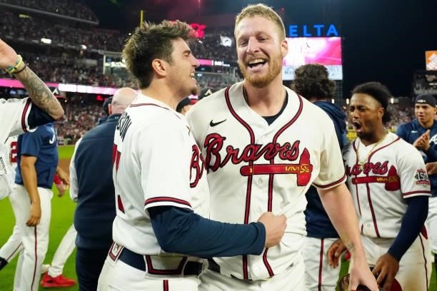 Will Smith and Luke Jackson of the Atlanta Braves celebrate after the Braves defeated the Milwaukee Brewers 5-4 in Game 4 of the NLDS at Truist Park...