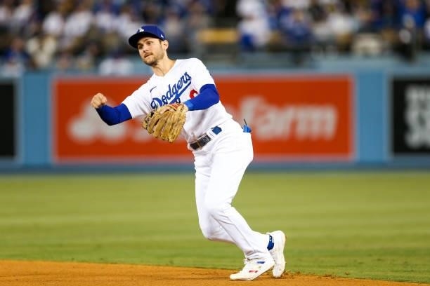 Trea Turner of the Los Angeles Dodgers throws to first in the sixth inning during Game 4 of the NLDS between the San Francisco Giants and the Los...