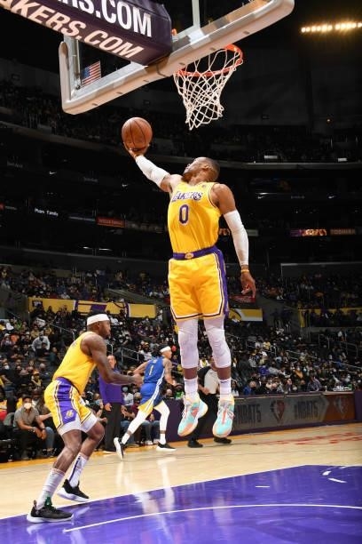 Russell Westbrook of the Los Angeles Lakers catches the rebound during a preseason game against the Golden State Warriors on October 12, 2021 at...