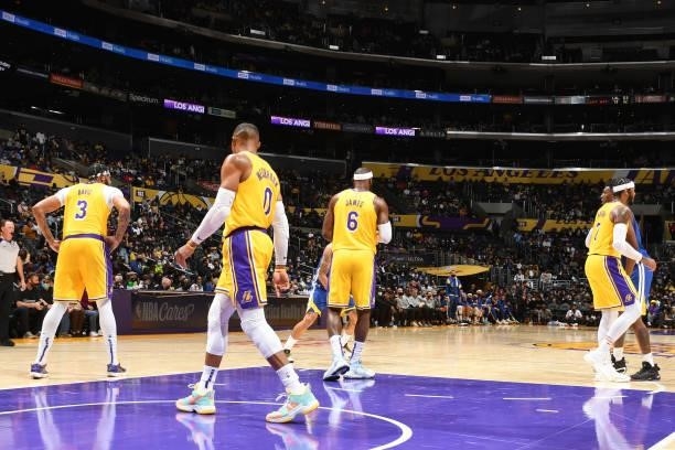 LeBron James, Carmelo Anthony, Russell Westbrook and Anthony Davis of the Los Angeles Lakers play defense on Golden State Warriors during a preseason...