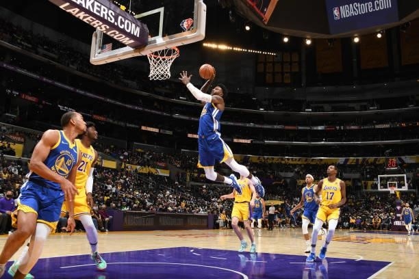 Jordan Bell of the Golden State Warriors drives to the basket during a preseason game against the Los Angeles Lakers on October 12, 2021 at STAPLES...
