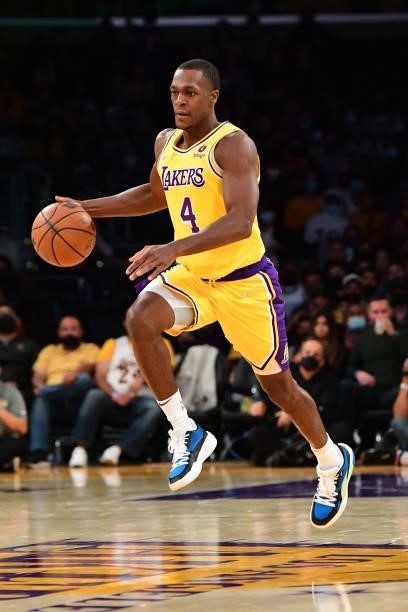 Rajon Rondo of the Los Angeles Lakers dribbles the ball during a preseason game against the Golden State Warriors on October 12, 2021 at STAPLES...