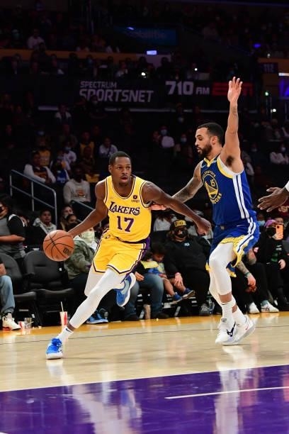 Joel Ayayi of the Los Angeles Lakers drives to the basket during a preseason game against the Golden State Warriors on October 12, 2021 at STAPLES...