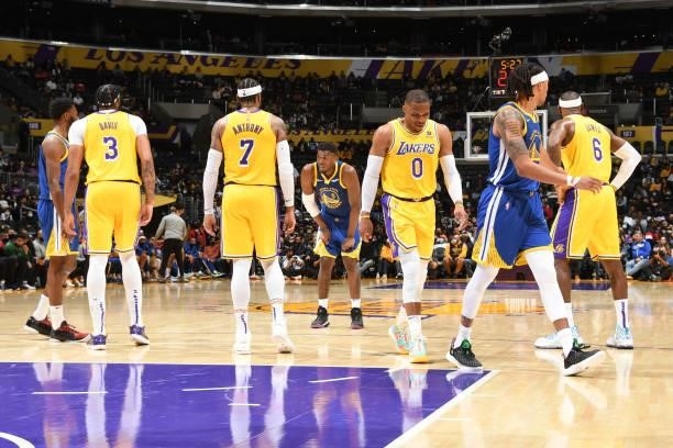 LeBron James, Carmelo Anthony, Russell Westbrook and Anthony Davis of the Los Angeles Lakers play defense on Golden State Warriors during a preseason...