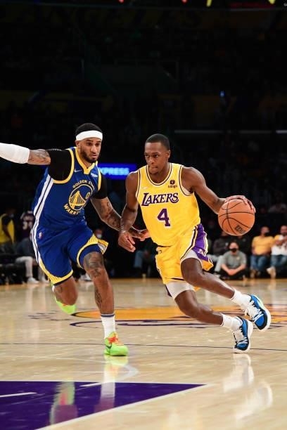 Rajon Rondo of the Los Angeles Lakers drives to the basket during a preseason game against the Golden State Warriors on October 12, 2021 at STAPLES...