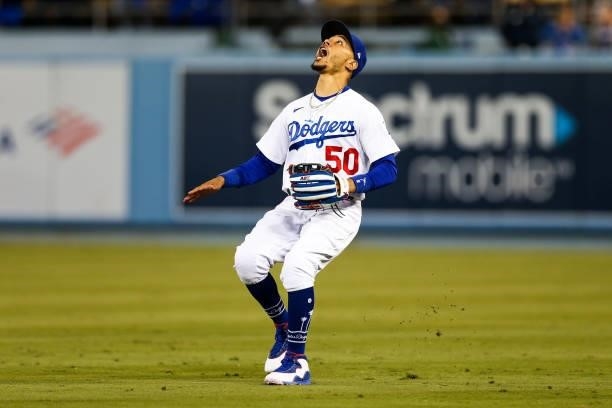 Mookie Betts of the Los Angeles Dodgers calls for a fly ball in the ninth inning during Game 4 of the NLDS between the San Francisco Giants and the...