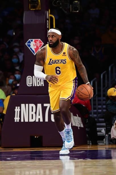 LeBron James of the Los Angeles Lakers dribbles the ball during a preseason game against the Golden State Warriors on October 12, 2021 at STAPLES...
