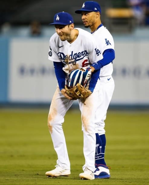 Trea Turner reacts to Mookie Betts of the Los Angeles Dodgers during Game 4 of the NLDS between the San Francisco Giants and the Los Angeles Dodgers...