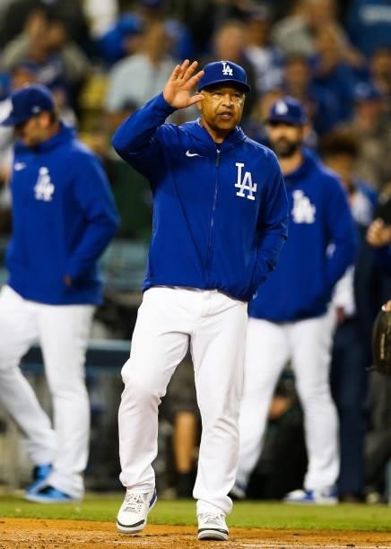 Dave Roberts of the Los Angeles Dodgers reacts after defeating the San Francisco Giants 7-2 in Game 4 of the NLDS between the San Francisco Giants...