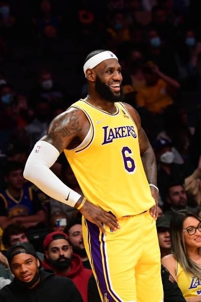 LeBron James of the Los Angeles Lakers smiles during a preseason game against the Golden State Warriors on October 12, 2021 at STAPLES Center in Los...