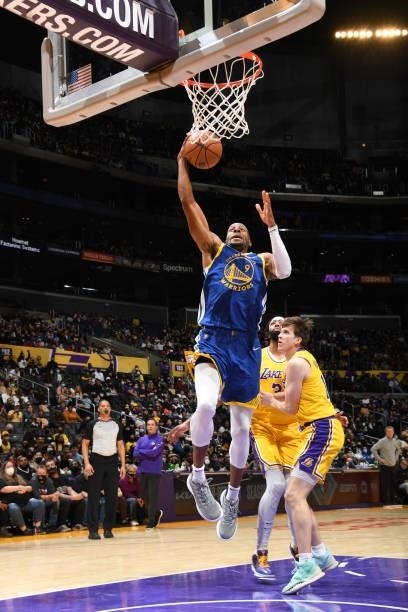 Andre Iguodala of the Golden State Warriors drives to the basket during a preseason game against the Los Angeles Lakers on October 12, 2021 at...