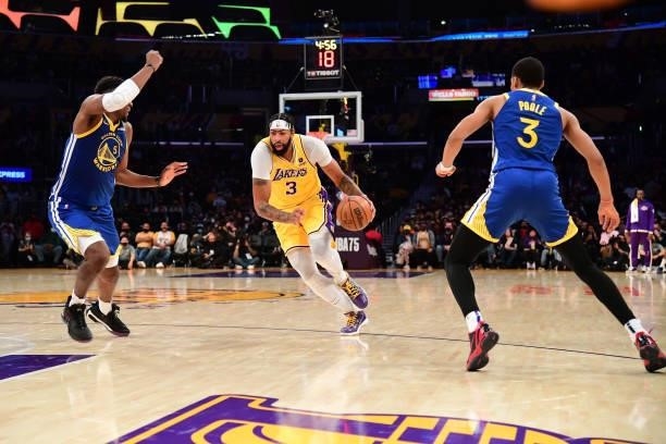 Anthony Davis of the Los Angeles Lakers dribbles the ball during a preseason game against the Golden State Warriors on October 12, 2021 at STAPLES...