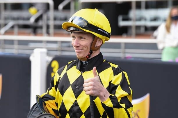 Damien Thornton after winning Schweppes Thousand Guineas aboard Yearning at Caulfield Racecourse on October 13, 2021 in Caulfield, Australia.