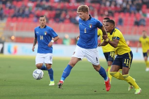 Matteo Lovato of U21 Italy fights for the ball against Amin Sar of U21 Sweden during the UEFA European Under-21 Championship Qualifier football match...