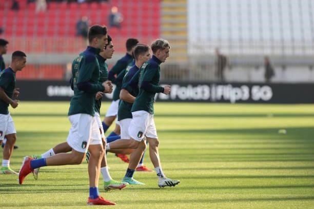 Italy players warm up during the UEFA European Under-21 Championship Qualifier football match between Italy U21 and Sweden U21 at U-Power Stadium,...