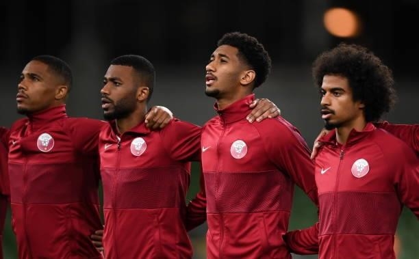 Dublin , Ireland - 12 October 2021; Qatar players, from left, Pedro Miguel, Abdelaziz Hatim, Homam Elamin and Akram Afif stand for the playing of the...