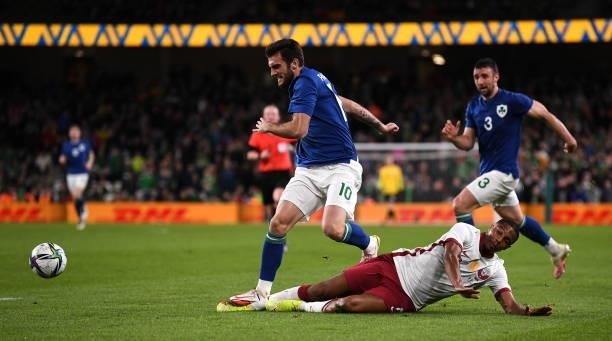 Dublin , Ireland - 12 October 2021; Troy Parrott of Republic of Ireland is tackled by Pedro Miguel of Qatar during the international friendly match...
