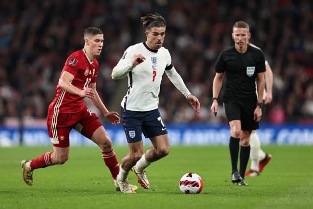 Jack Grealish of England in action with Roland Sallai of Hungary during the 2022 FIFA World Cup Qualifier match between England and Hungary at...