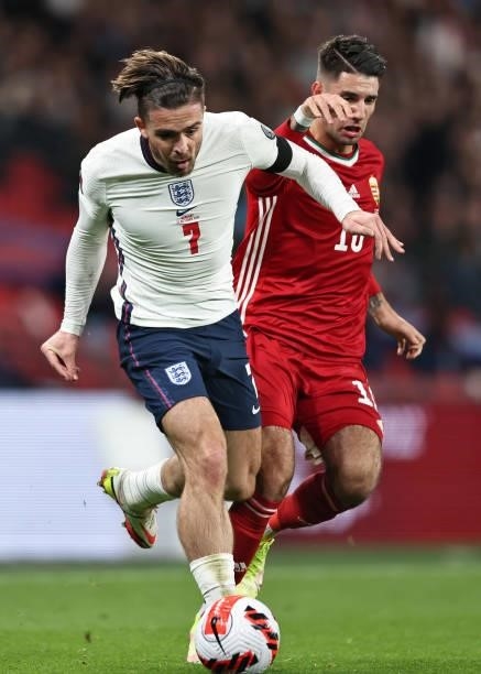 Jack Grealish of England in action with Dominik Szoboszlai of Hungary during the 2022 FIFA World Cup Qualifier match between England and Hungary at...