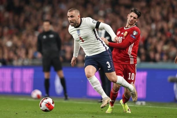 Luke Shaw of England in action with Dominik Szoboszlai of Hungary during the 2022 FIFA World Cup Qualifier match between England and Hungary at...