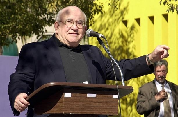 Actor Ed Asner speaks to a crowd protesting the legitimacy and agenda of President George W. Bush January 20, 2001 in Los Angeles, CA. About 1800...