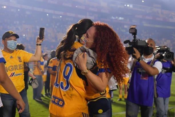 Blanca Solís of Tigres UANL femenil celebrates with her family after winning the Final second leg match between Tigres UANL and Chivas as part of the...