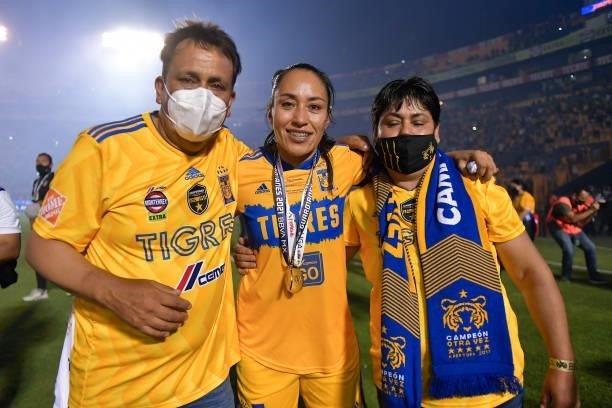 Liliana Mercado of Tigres UANL femenil celebrates with her family after winning the Final second leg match between Tigres UANL and Chivas as part of...