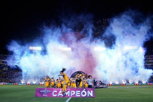 Players of Tigres celebrate with the champion trophy after winning the Final second leg match between Tigres UANL and Chivas as part of the Torneo...