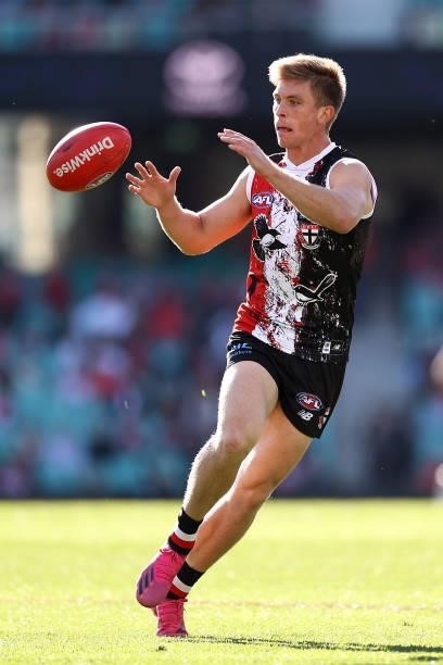 Sebastian Ross of the Saints gathers the ball during the round 12 AFL match between the St Kilda Saints and the Sydney Swans at Sydney Cricket Ground...