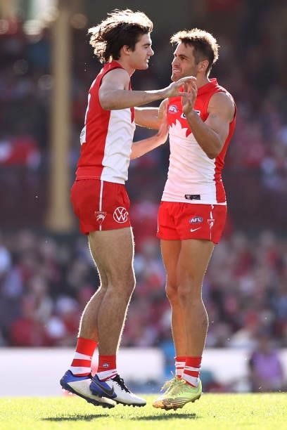 Logan McDonald of the Swans is congratulated by Josh P. Kennedy after kicking a goal during the round 12 AFL match between the St Kilda Saints and...