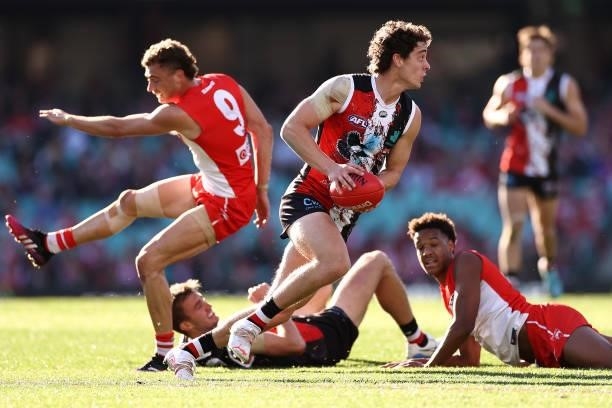 Nick Coffield of the Saints gathers the ball during the round 12 AFL match between the St Kilda Saints and the Sydney Swans at Sydney Cricket Ground...