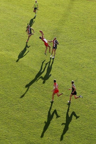 Tom McCartin of the Swans marks during the round 12 AFL match between the St Kilda Saints and the Sydney Swans at Sydney Cricket Ground on June 05,...