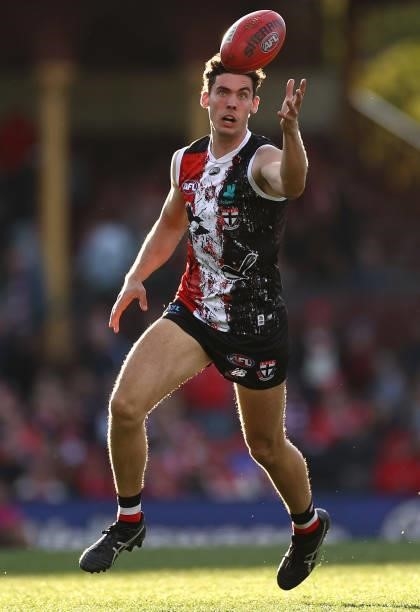 Oscar Clavarino of the Saints gathers the ball during the round 12 AFL match between the St Kilda Saints and the Sydney Swans at Sydney Cricket...