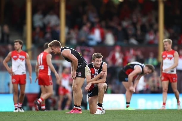 Sebastian Ross and Dougal Howard of the Saints look dejected after losing the round 12 AFL match between the St Kilda Saints and the Sydney Swans at...
