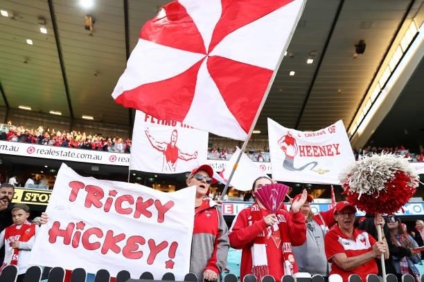 Swans supporters cheer during the round 12 AFL match between the St Kilda Saints and the Sydney Swans at Sydney Cricket Ground on June 05, 2021 in...
