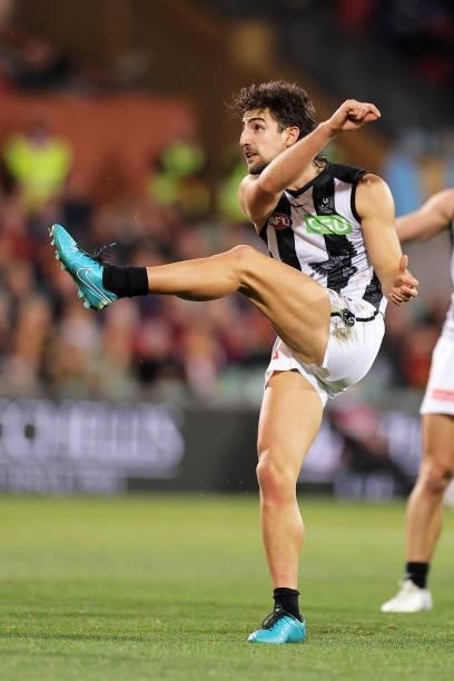 Josh Daicos of the Magpies kicks for goal during the round 12 AFL match between the Adelaide Crows and the Collingwood Magpies at Adelaide Oval on...