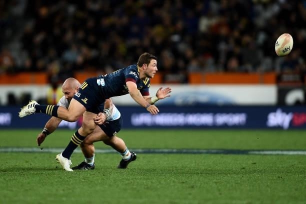 Mitchell Hunt of the Highlanders passes the ball during the round four Super Rugby Trans-Tasman match between the Highlanders and the NSW Waratahs at...