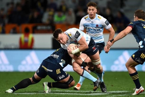 Jack Dempsey of the Waratahs runs into the defence during the round four Super Rugby Trans-Tasman match between the Highlanders and the NSW Waratahs...