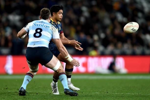 Josh Ioane of the Highlanders passes the ball during the round four Super Rugby Trans-Tasman match between the Highlanders and the NSW Waratahs at...