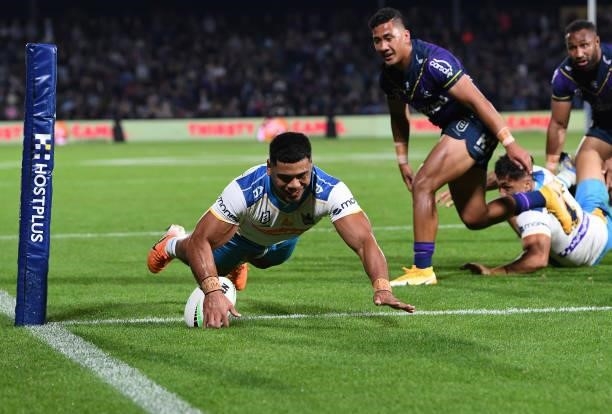Greg Marzhew of the Titans scores a try during the round 13 NRL match between the Melbourne Storm and the Gold Coast Titans at Sunshine Coast...