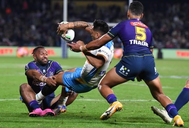 Patrick Herbert of the Titans makes a pass during the round 13 NRL match between the Melbourne Storm and the Gold Coast Titans at Sunshine Coast...