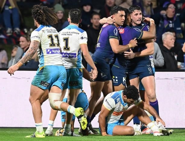 Trent Loiero of the Storm celebrates after scoring a try during the round 13 NRL match between the Melbourne Storm and the Gold Coast Titans at...