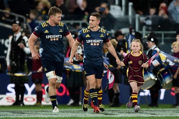 James Lentjes of the Highlanders runs onto the field with Kayne Hammington of the Highlanders during the round four Super Rugby Trans-Tasman match...
