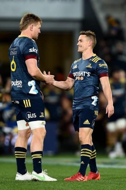 James Lentjes of the Highlanders claps hands with Kayne Hammington of the Highlanders ahead of the round four Super Rugby Trans-Tasman match between...