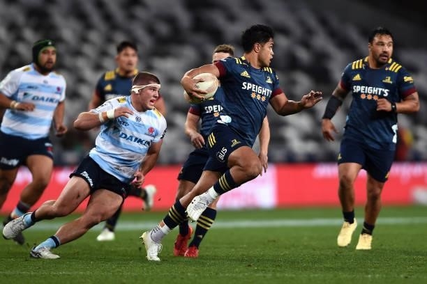 Josh Ioane of the Highlanders makes a run with the ball during the round four Super Rugby Trans-Tasman match between the Highlanders and the NSW...
